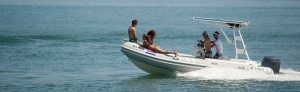people enjoying sailing on a rigid Inflatable sailing boat