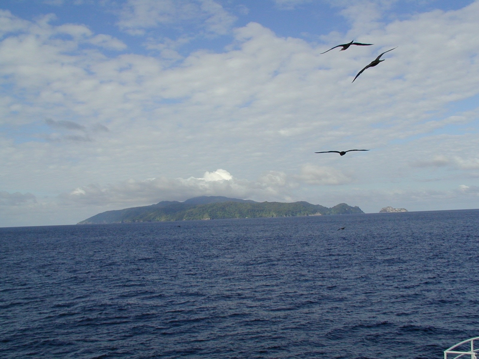 Cocos Island on the horizon, seen from a boat