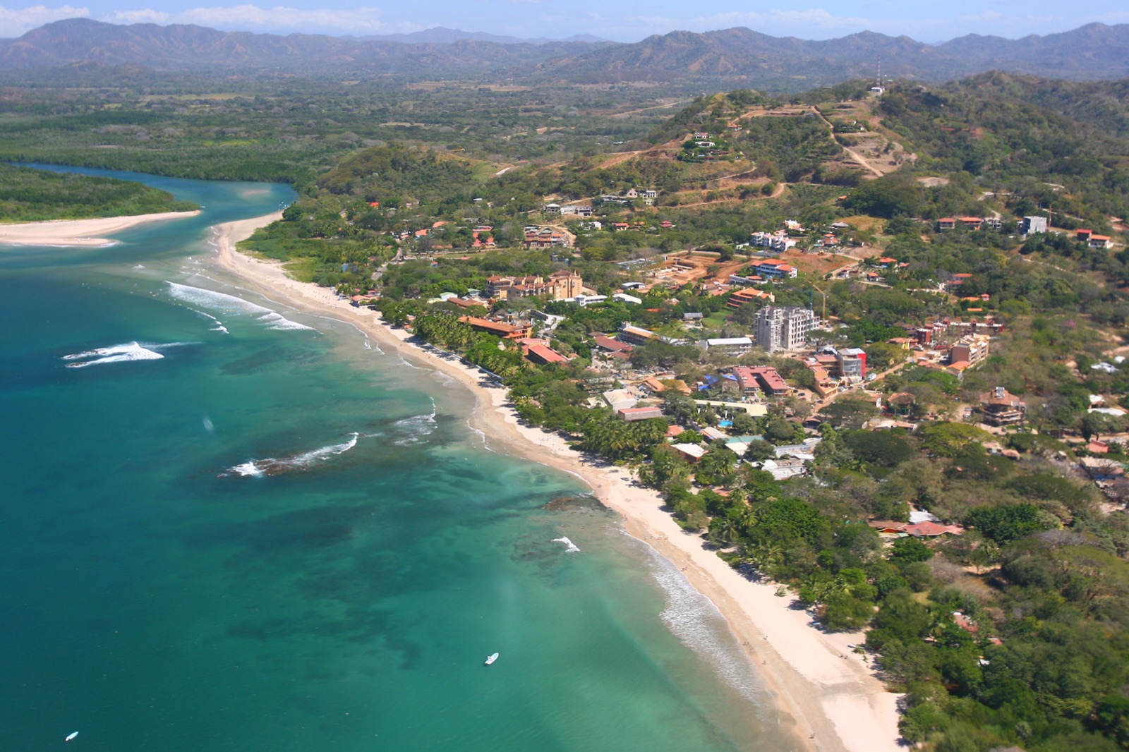 Playa Tamarindo and the river mouth from the air